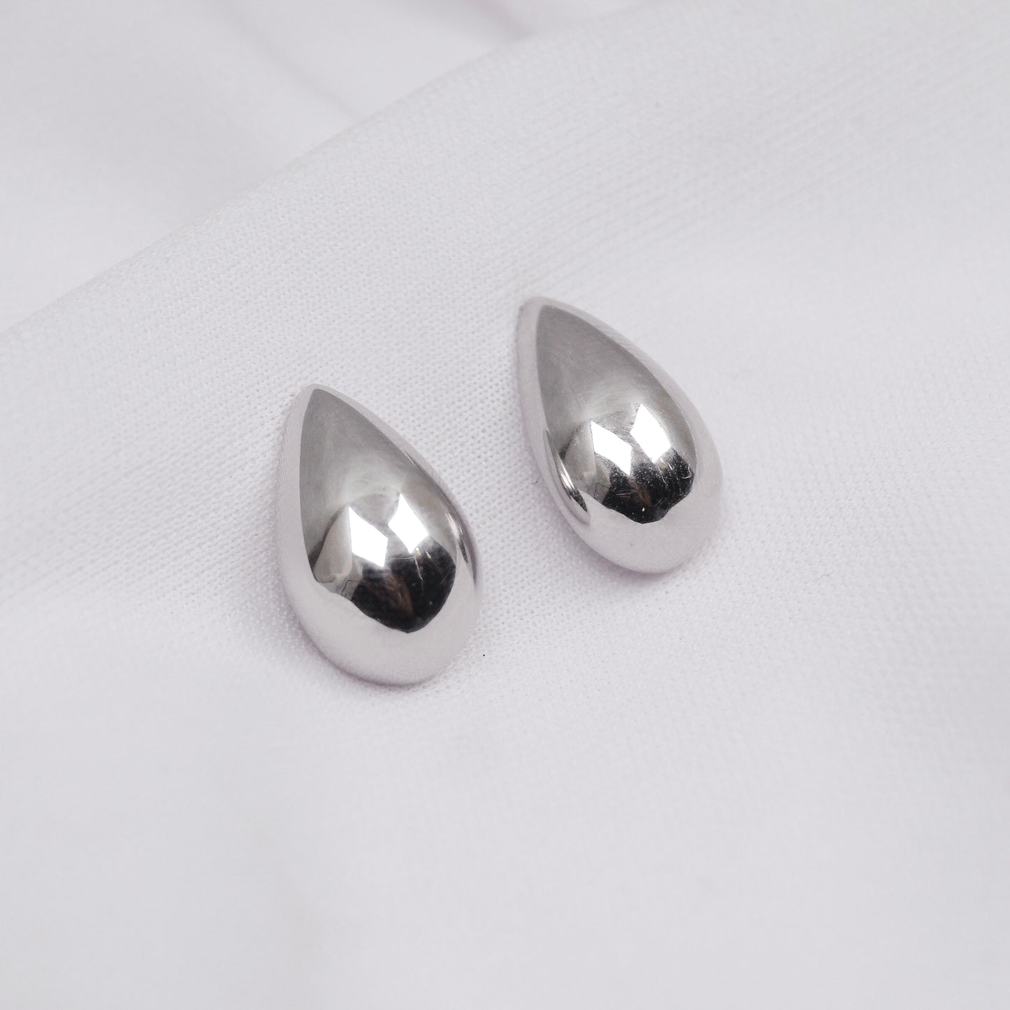Aretes plata ley gota de lado dosce joyeria
