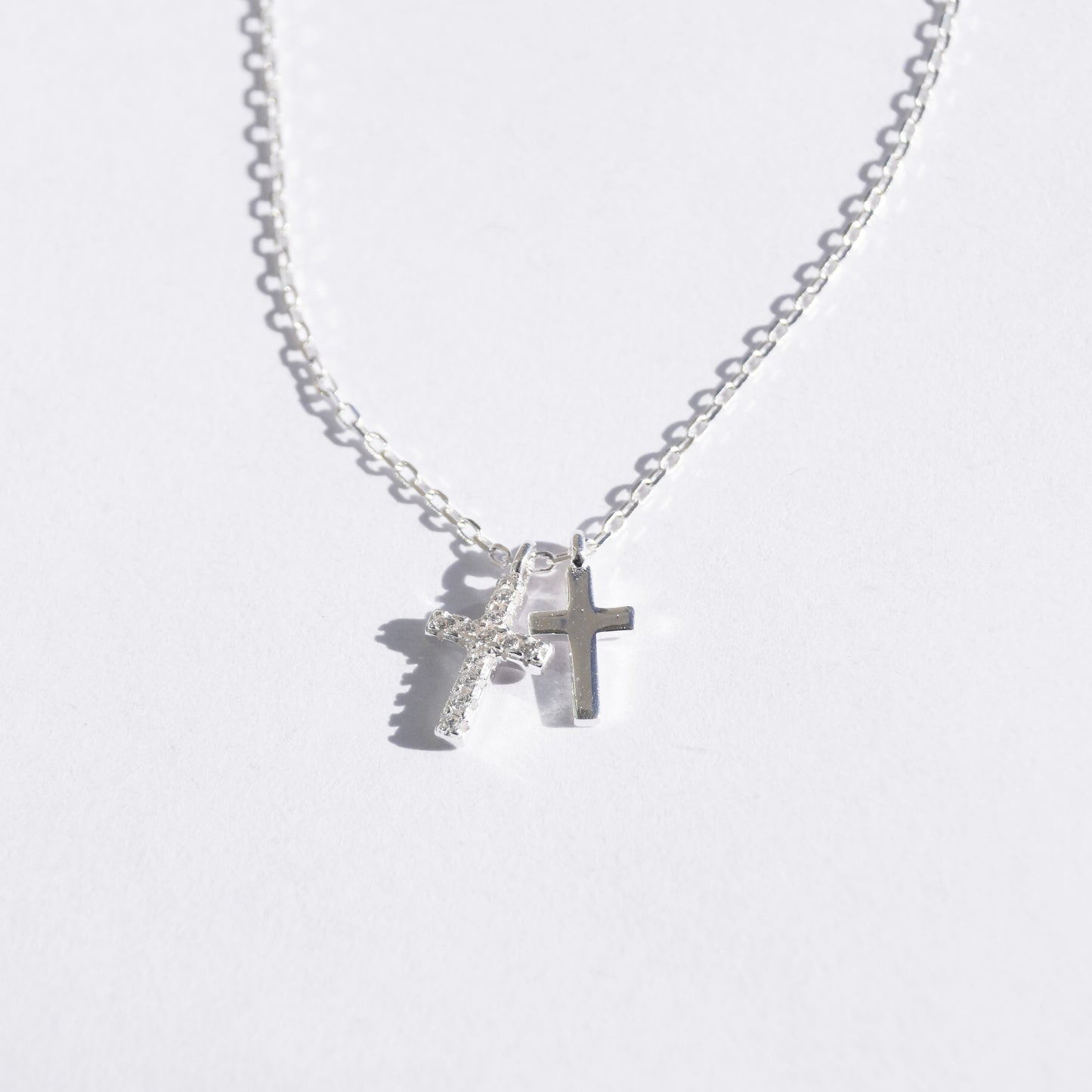 Collar doble cruz con zirconias plata ley dosce joyeria