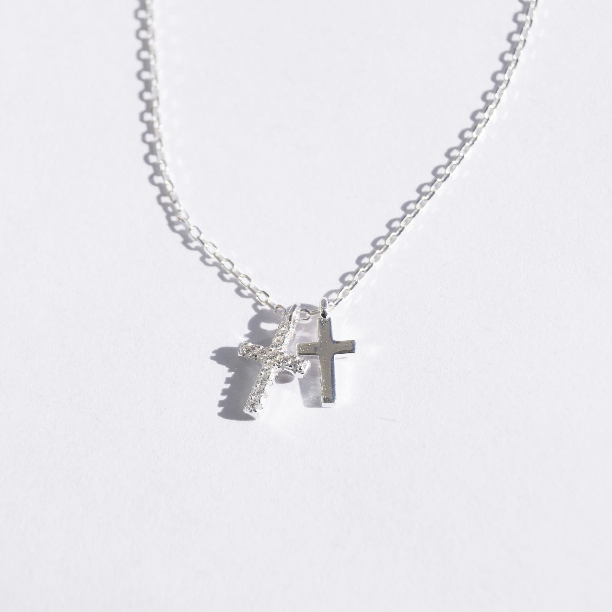 Collar doble cruz con zirconias plata ley dosce joyeria