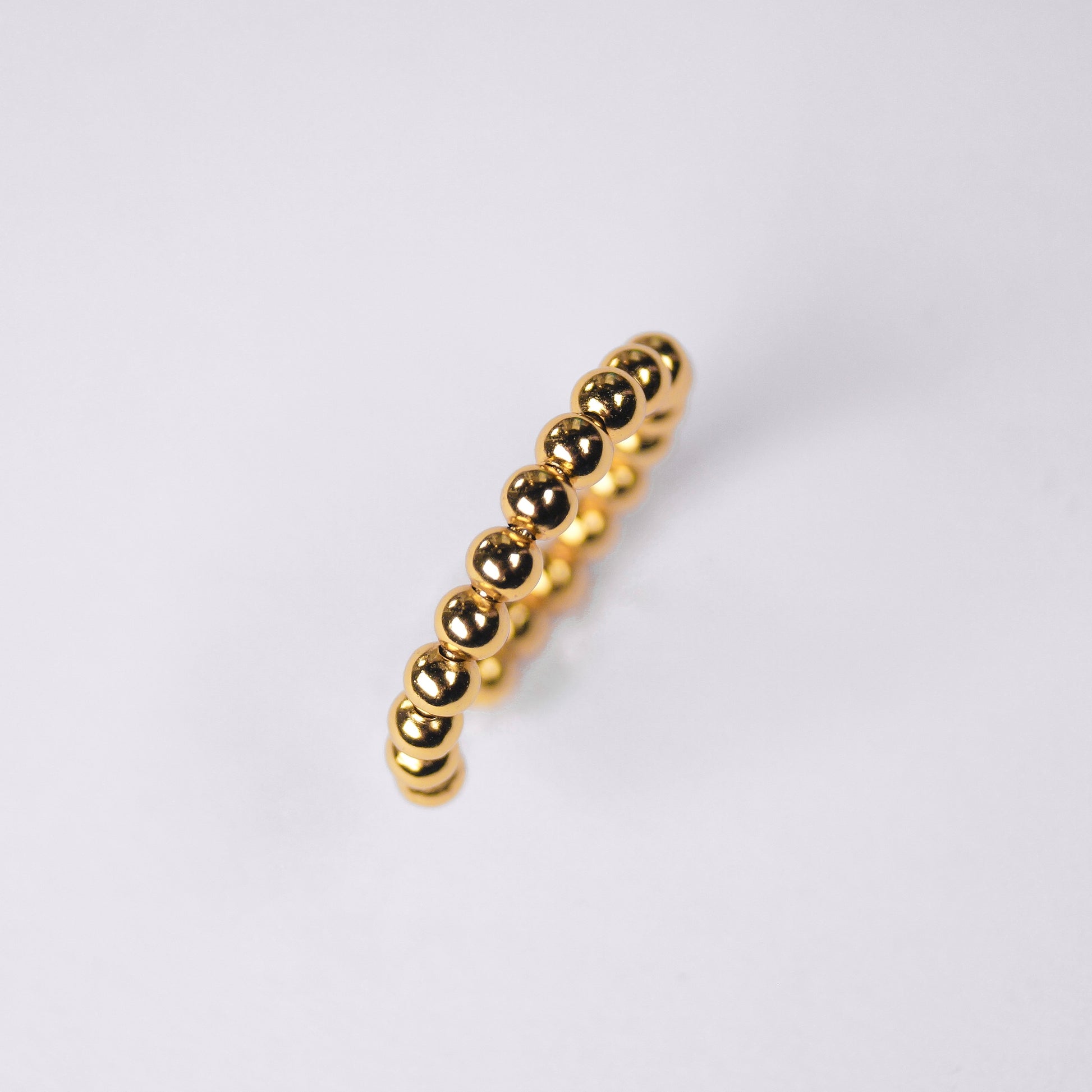 anillo dorado ajustable bolitas dosce joyeria
