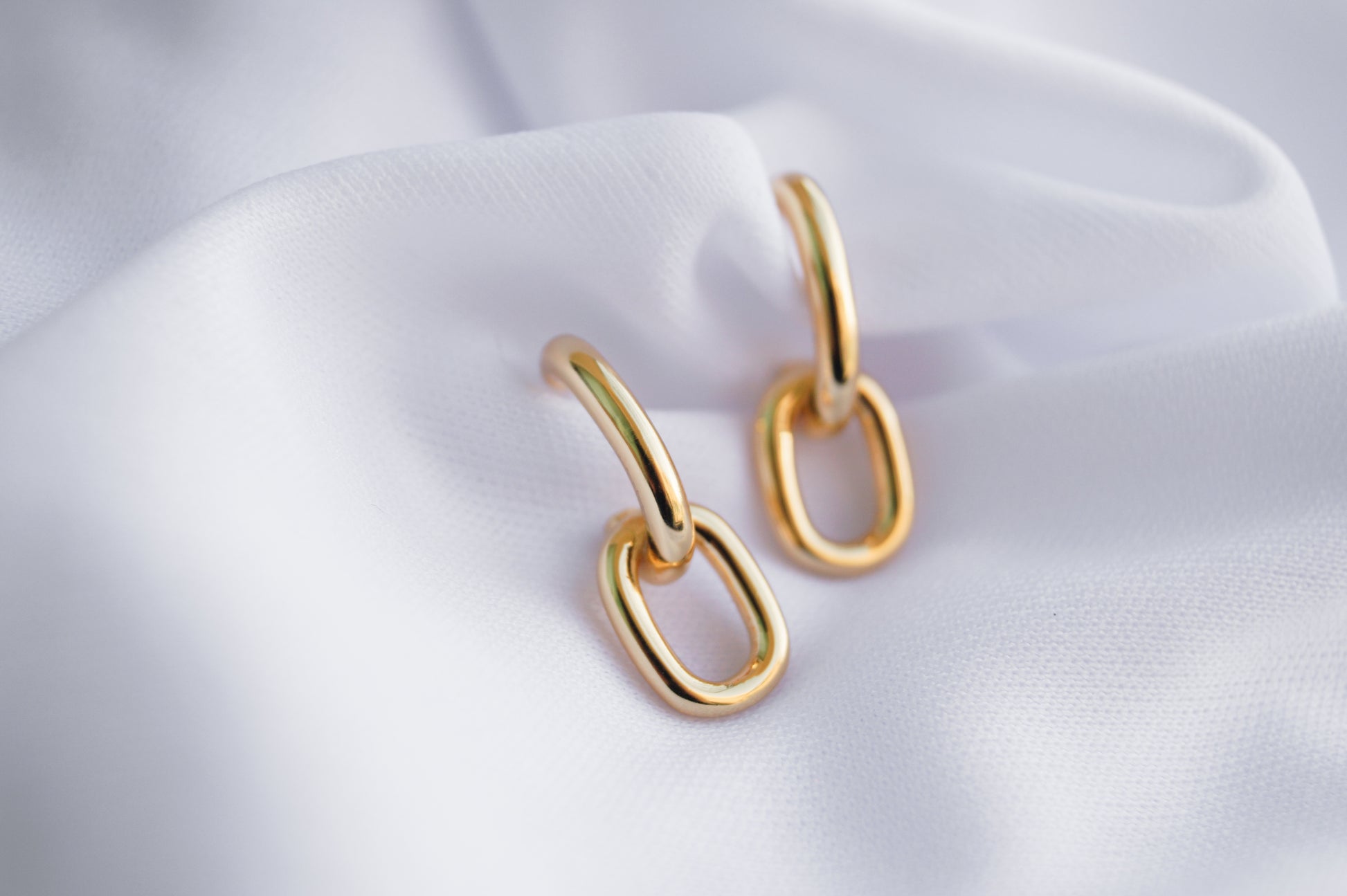 aretes enchapados en oro en plata ley eslabones dosce joyeria waterproof