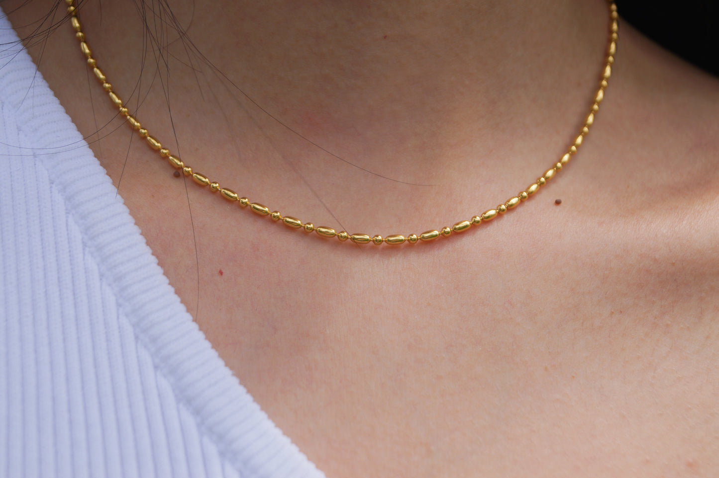 collar enchapado en oro en plata ley frijoles puesto